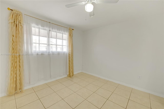 13250 SW 58th Ter Unit 10-8, Miami, FL 33183 - empty room featuring tile patterned floors, baseboards, and a ceiling fan
