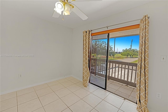 13250 SW 58th Ter Unit 10-8, Miami, FL 33183 - tiled spare room featuring baseboards and ceiling fan