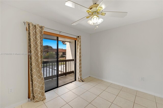 13250 SW 58th Ter Unit 10-8, Miami, FL 33183 - tiled spare room with baseboards and ceiling fan