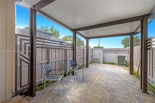 13250 SW 58th Ter Unit 10-8, Miami, FL 33183 - view of patio / terrace with a fenced backyard and cooling unit