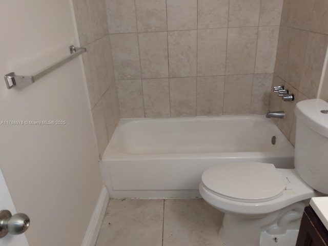 bathroom featuring tile patterned flooring, toilet, and vanity