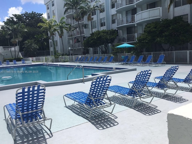 pool featuring fence