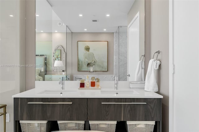 480 NE 31st St Unit 4701, Miami, FL 33137 - bathroom featuring recessed lighting, double vanity, ensuite bathroom, and a sink