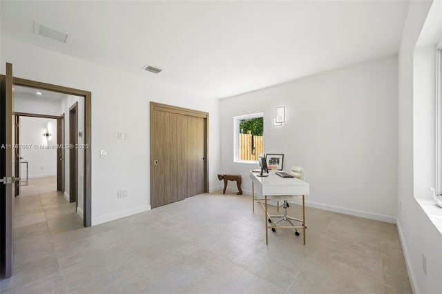 office with visible vents and baseboards