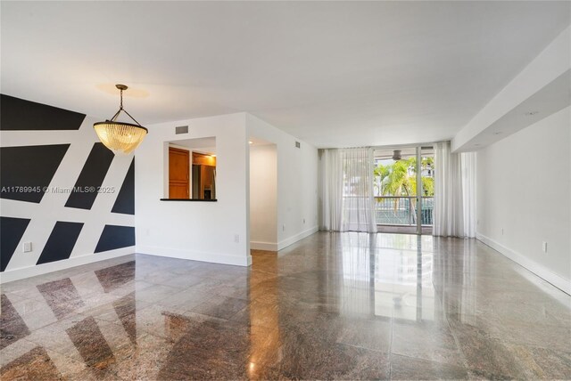 3769 NE 209th Ter, Aventura, FL 33180 - kitchen featuring appliances with stainless steel finishes, a sink, light stone countertops, brown cabinetry, and recessed lighting