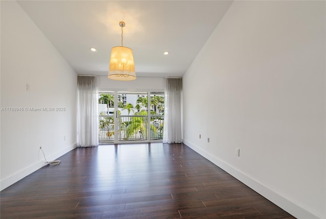 3769 NE 209th Ter, Aventura, FL 33180 - unfurnished room featuring baseboards, dark wood-style floors, and recessed lighting