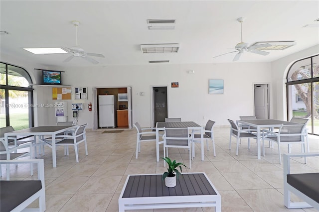 8101 SW 72nd Ave Unit 304W, Miami, FL 33143 - dining room featuring a ceiling fan and healthy amount of natural light
