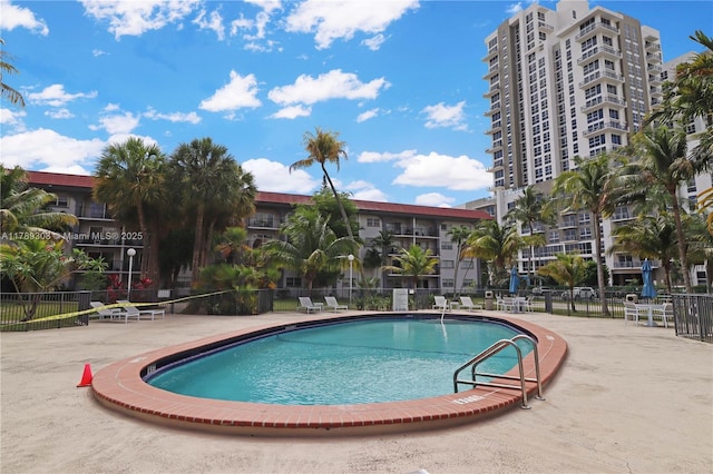 8101 SW 72nd Ave Unit 304W, Miami, FL 33143 - community pool with fence and a patio area