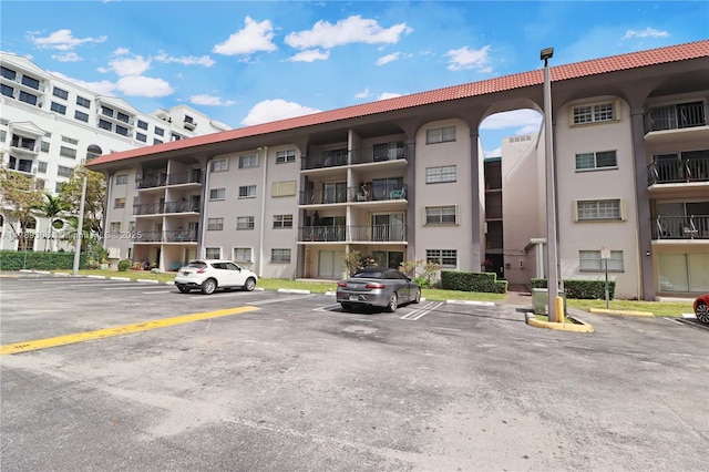 8101 SW 72nd Ave Unit 304W, Miami, FL 33143 - view of apartment building / complex featuring uncovered parking