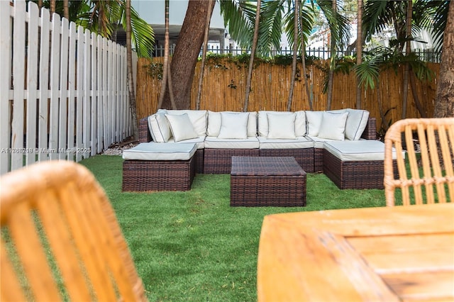view of patio with outdoor lounge area and a fenced backyard