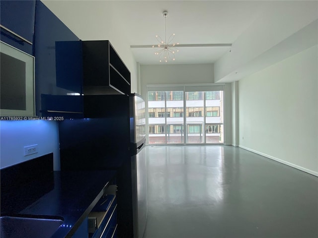 253 NE 2nd St Unit 324, Miami, FL 33132 - kitchen featuring concrete flooring and open floor plan