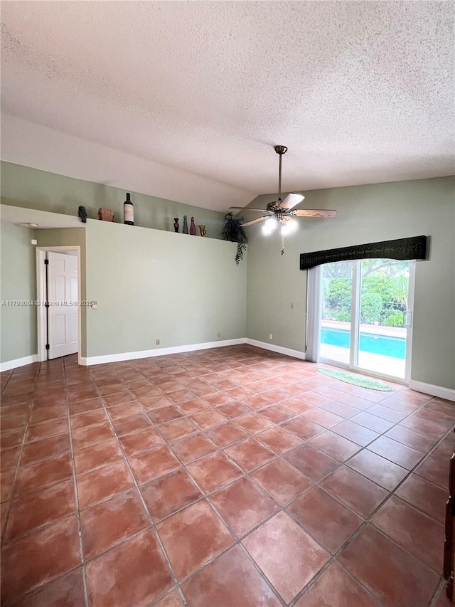 9271 Arborwood Cir, Davie, FL 33328 - empty room with a textured ceiling, ceiling fan, and tile patterned floors