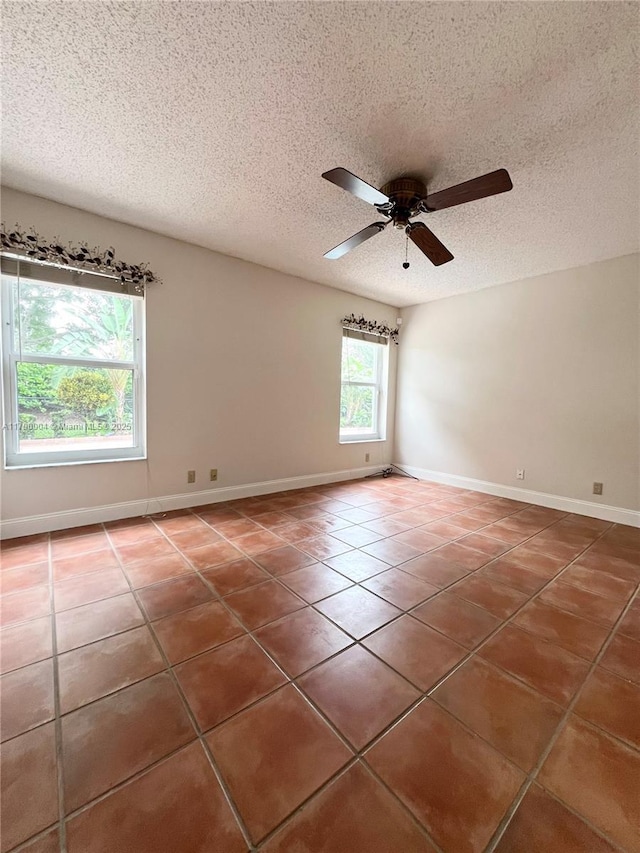 9271 Arborwood Cir, Davie, FL 33328 - tiled empty room with a textured ceiling and ceiling fan