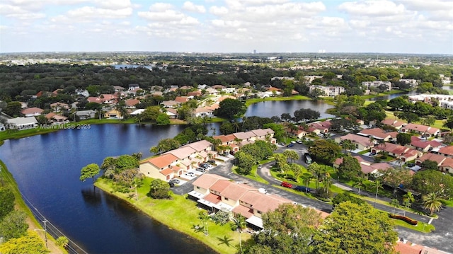 9271 Arborwood Cir, Davie, FL 33328 - aerial overview of property's location featuring a large body of water and nearby suburban area