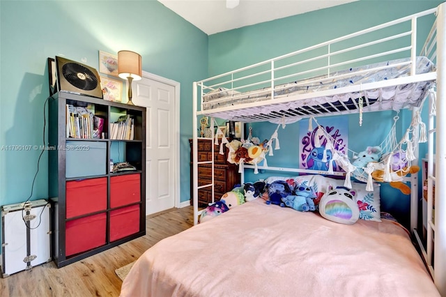 bedroom featuring wood finished floors
