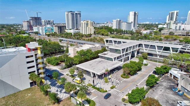 drone / aerial view featuring a city view