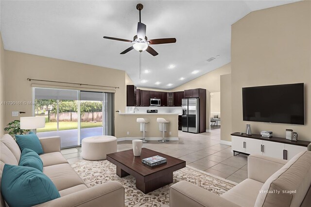 3562 W Southern Orchard Rd W, Davie, FL 33328 - kitchen with stainless steel appliances, vaulted ceiling, tasteful backsplash, ceiling fan, and a peninsula