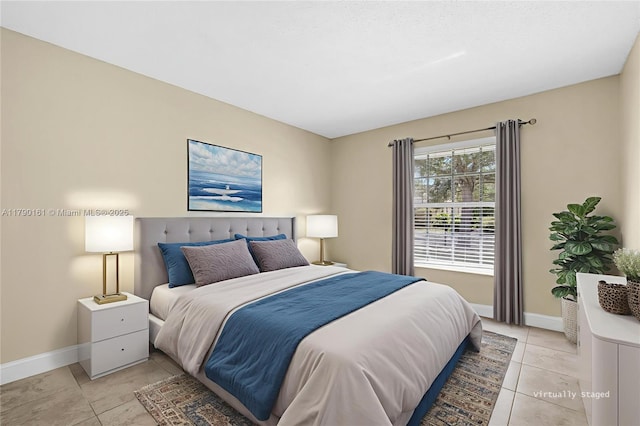 3562 W Southern Orchard Rd W, Davie, FL 33328 - bedroom with baseboards and light tile patterned floors