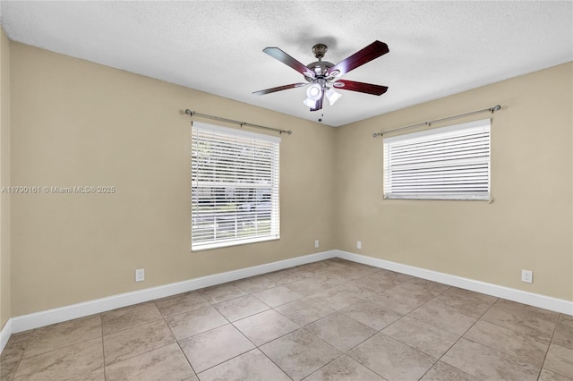3562 W Southern Orchard Rd W, Davie, FL 33328 - tiled spare room with a ceiling fan and a textured ceiling