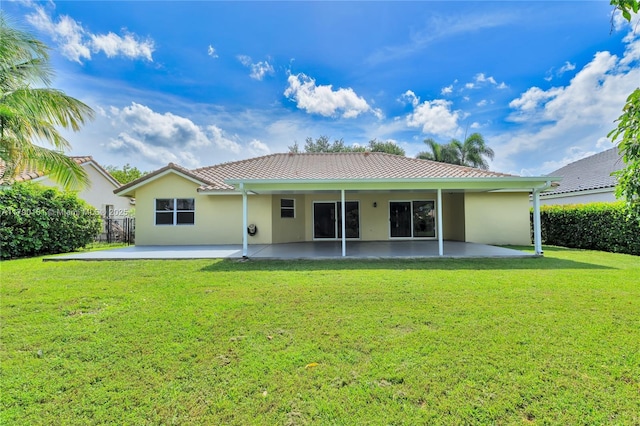 3562 W Southern Orchard Rd W, Davie, FL 33328 - back of property featuring a patio area, stucco siding, and a metal roof