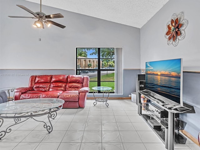 9401 NW 14th Ct Unit 224, Pembroke Pines, FL 33024 - living room with high vaulted ceiling, ceiling fan, baseboards, and a textured ceiling