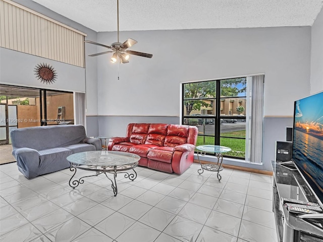 9401 NW 14th Ct Unit 224, Pembroke Pines, FL 33024 - living room featuring vaulted ceiling, a textured ceiling, and ceiling fan
