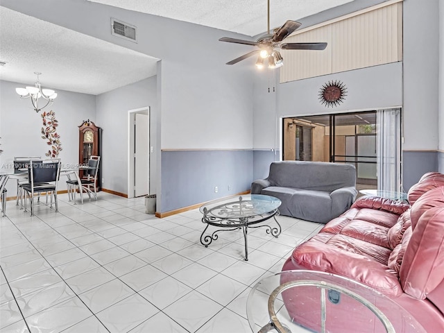 9401 NW 14th Ct Unit 224, Pembroke Pines, FL 33024 - living area with baseboards, a textured ceiling, visible vents, and ceiling fan with notable chandelier