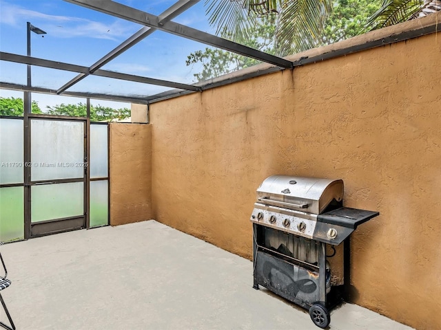 9401 NW 14th Ct Unit 224, Pembroke Pines, FL 33024 - view of patio with grilling area and glass enclosure