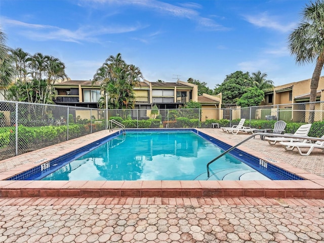 9401 NW 14th Ct Unit 224, Pembroke Pines, FL 33024 - pool featuring fence and a patio area