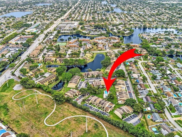 9401 NW 14th Ct Unit 224, Pembroke Pines, FL 33024 - bird's eye view with a water view and a residential view