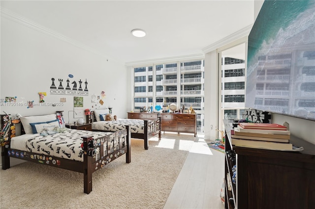 10225 Collins Ave Unit 904, Bal Harbour, FL 33154 - bedroom with crown molding, wood finished floors, and floor to ceiling windows