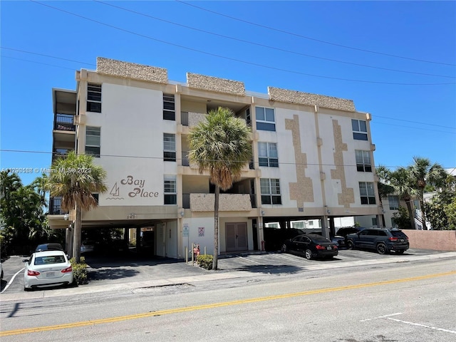 2420 Diana Dr Unit 203, Hallandale Beach, FL 33009 - view of property featuring uncovered parking