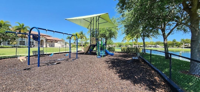 community jungle gym featuring fence