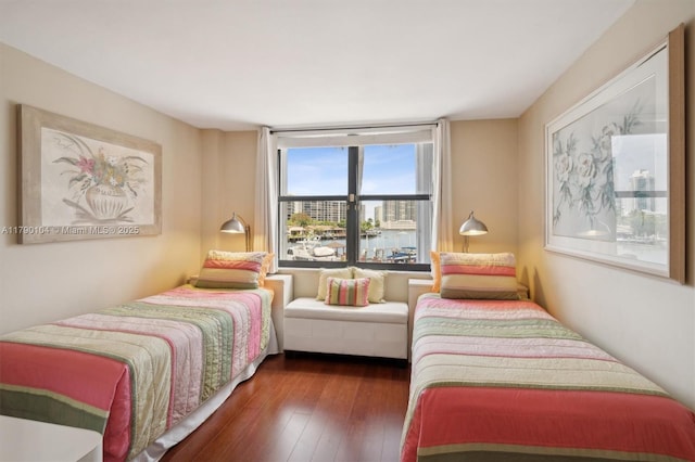 bedroom with hardwood / wood-style floors