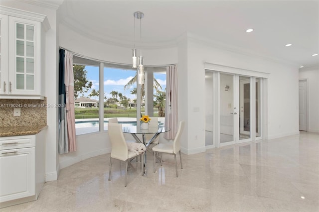 15355 SW 34th St, Davie, FL 33331 - dining space featuring ornamental molding and recessed lighting