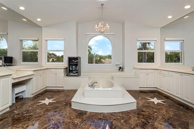 15355 SW 34th St, Davie, FL 33331 - full bathroom featuring vaulted ceiling, plenty of natural light, a tub with jets, marble tiled floors, and recessed lighting
