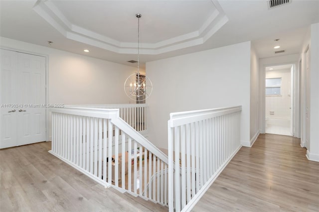 15355 SW 34th St, Davie, FL 33331 - corridor featuring an upstairs landing, wood finished floors, a raised ceiling, a chandelier, and recessed lighting