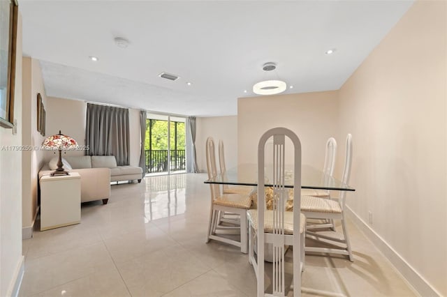 dining room featuring light tile patterned floors, recessed lighting, visible vents, and baseboards
