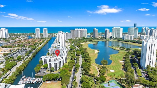 aerial view featuring a water view and a city view