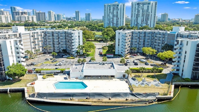 aerial view with a water view and a city view