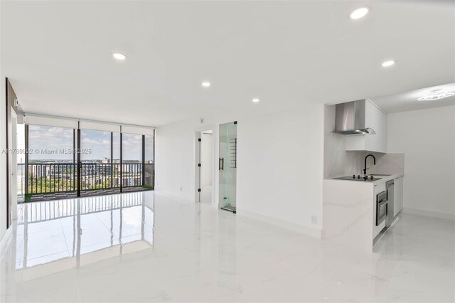 20335 W Country Club Dr Unit 1902, Aventura, FL 33180 - unfurnished living room featuring recessed lighting and light marble finish flooring