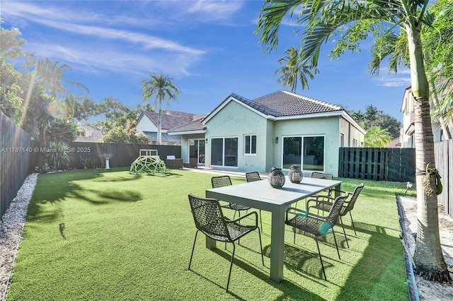 9248 Magnolia Ct, Davie, FL 33328 - back of house with stucco siding and a tiled roof