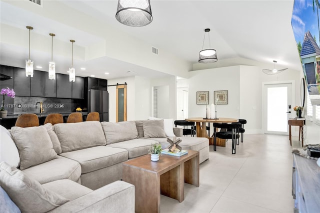 9248 Magnolia Ct, Davie, FL 33328 - living area featuring lofted ceiling, light tile patterned flooring, and a barn door