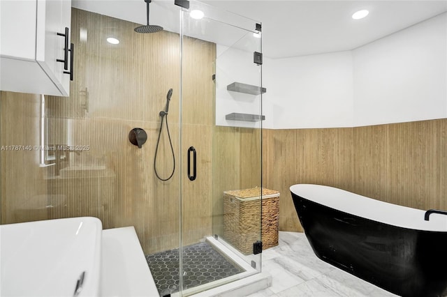 9248 Magnolia Ct, Davie, FL 33328 - full bath featuring marble finish floors, a freestanding bath, a stall shower, and wainscoting