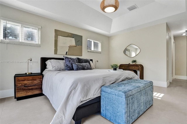 9248 Magnolia Ct, Davie, FL 33328 - bedroom featuring multiple windows, a raised ceiling, and light tile patterned floors