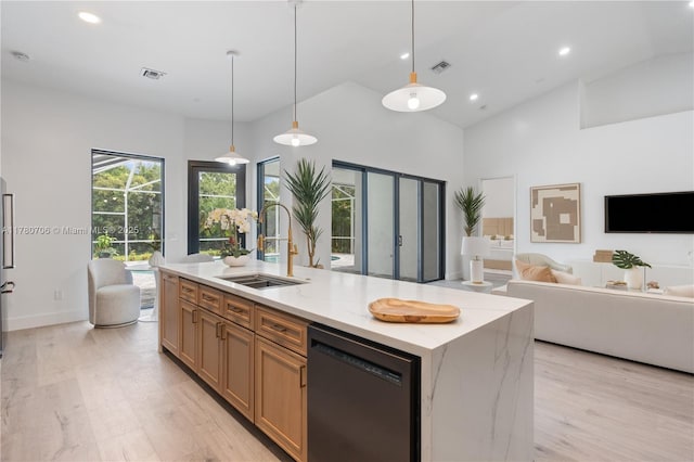 12020 NW 11th St, Plantation, FL 33323 - kitchen featuring a sink, dishwasher, open floor plan, light wood-type flooring, and recessed lighting