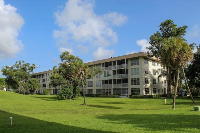 surrounding community with a yard
