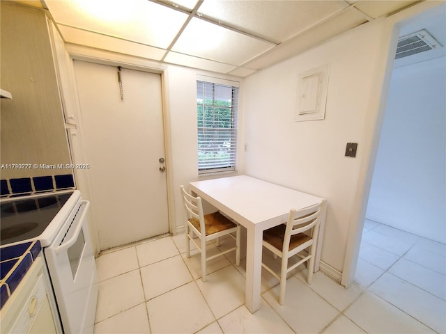 dining room with visible vents and light tile patterned floors