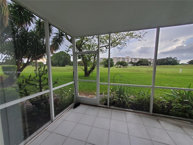 unfurnished sunroom featuring plenty of natural light
