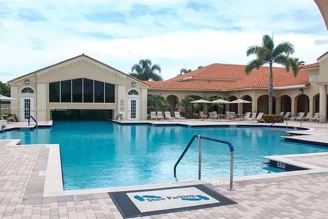 community pool with a patio